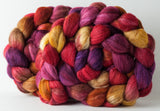 Merino/superwash merino/silk (MMS) spinning fiber: Red, gold, orange. caramel, purple